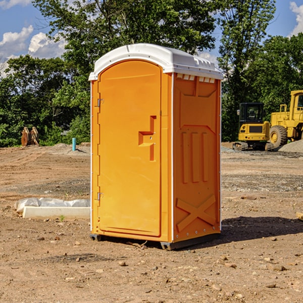 what is the cost difference between standard and deluxe portable restroom rentals in Bishop IL